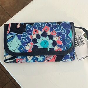 Vera Bradley NWT trimmed wristlet in Lotus Flower Swirl. Specs in photo.